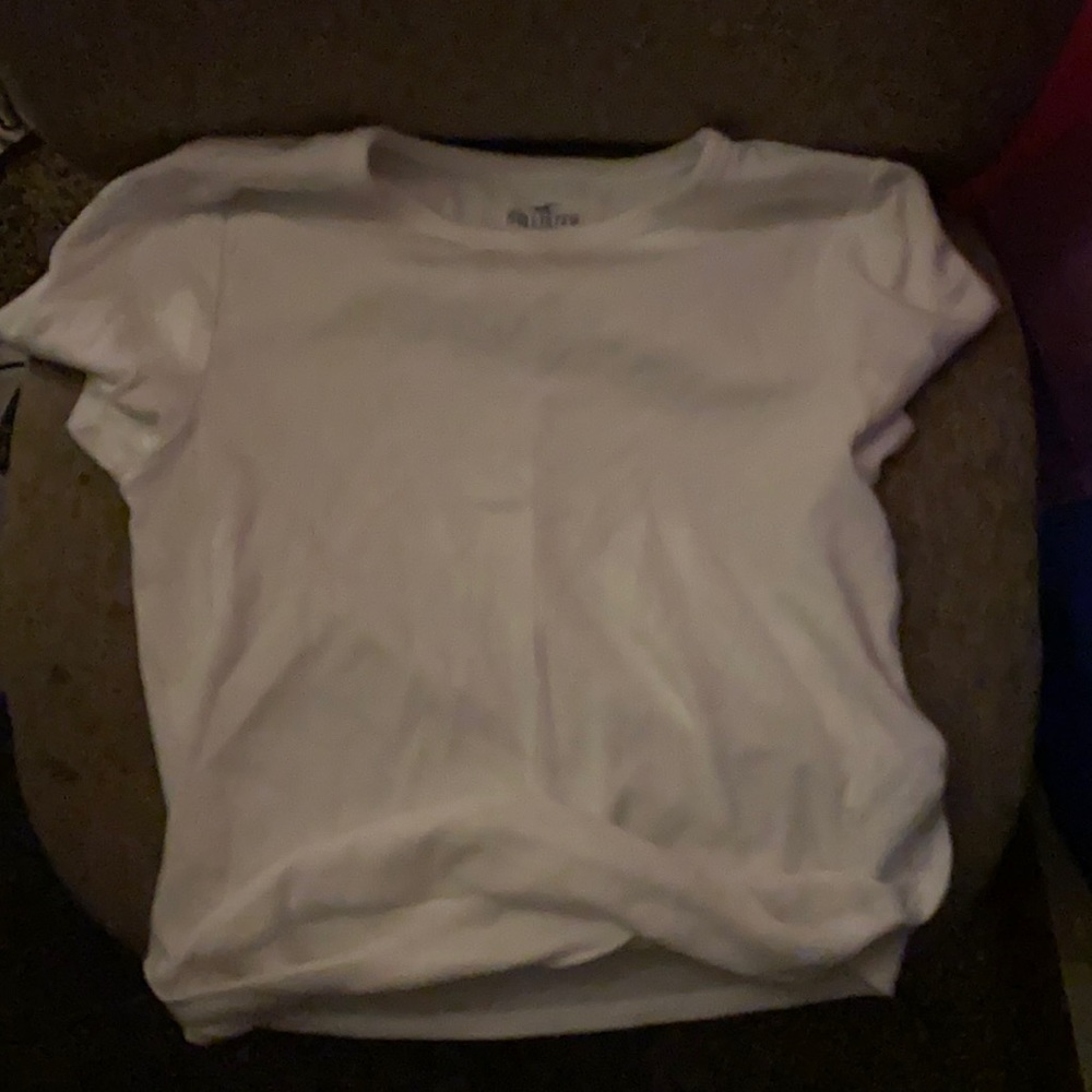 White tshirt cross in the front